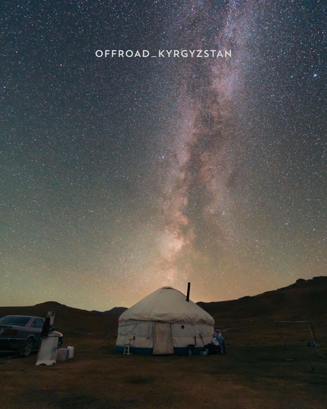 A traditional Kyrgyz yurt illuminated under a brilliant starry night sky at the shore of Son-Kul lake at 3016 meters above the sea.